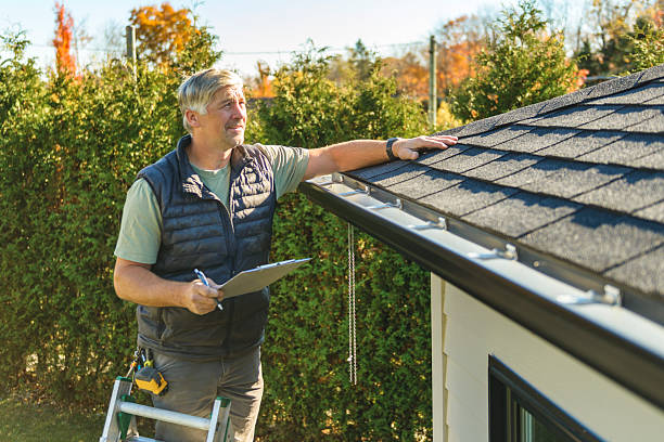 Professional Roofing technician working in Windsor Mill, MD